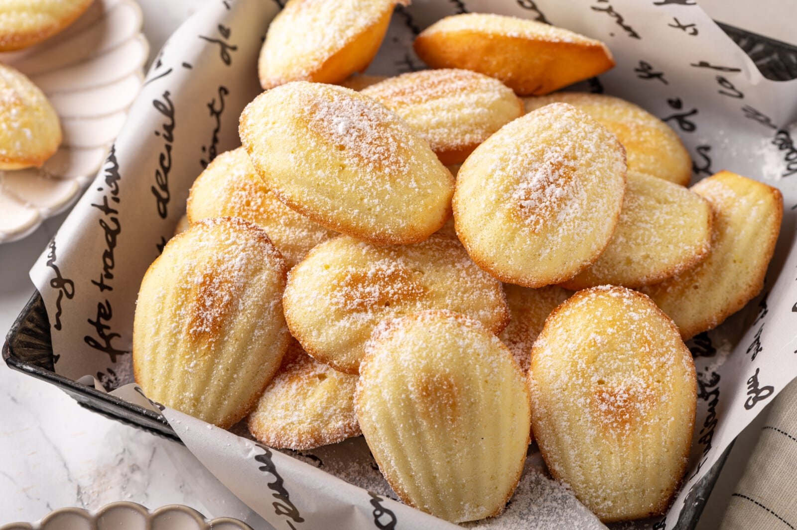 Close up of freshly baked madeleines.