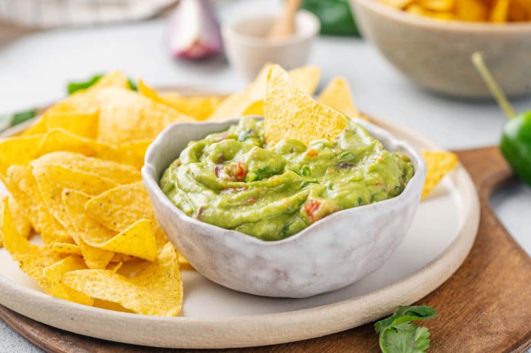 Ready to eat guacamole recipe, serving with chips.