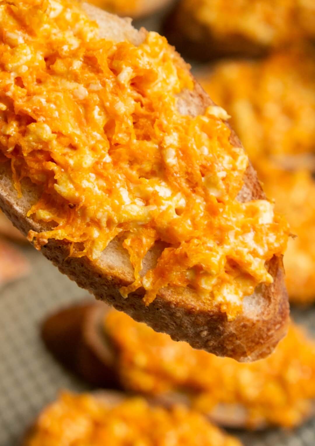carrot-cheese-appetizer-with-more-crostinis-in-the-background