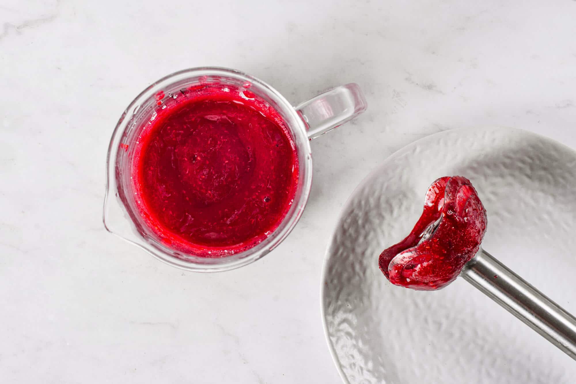 raspberry-jam-in-a-glass-measuring-cup-with-an-immersion-blender