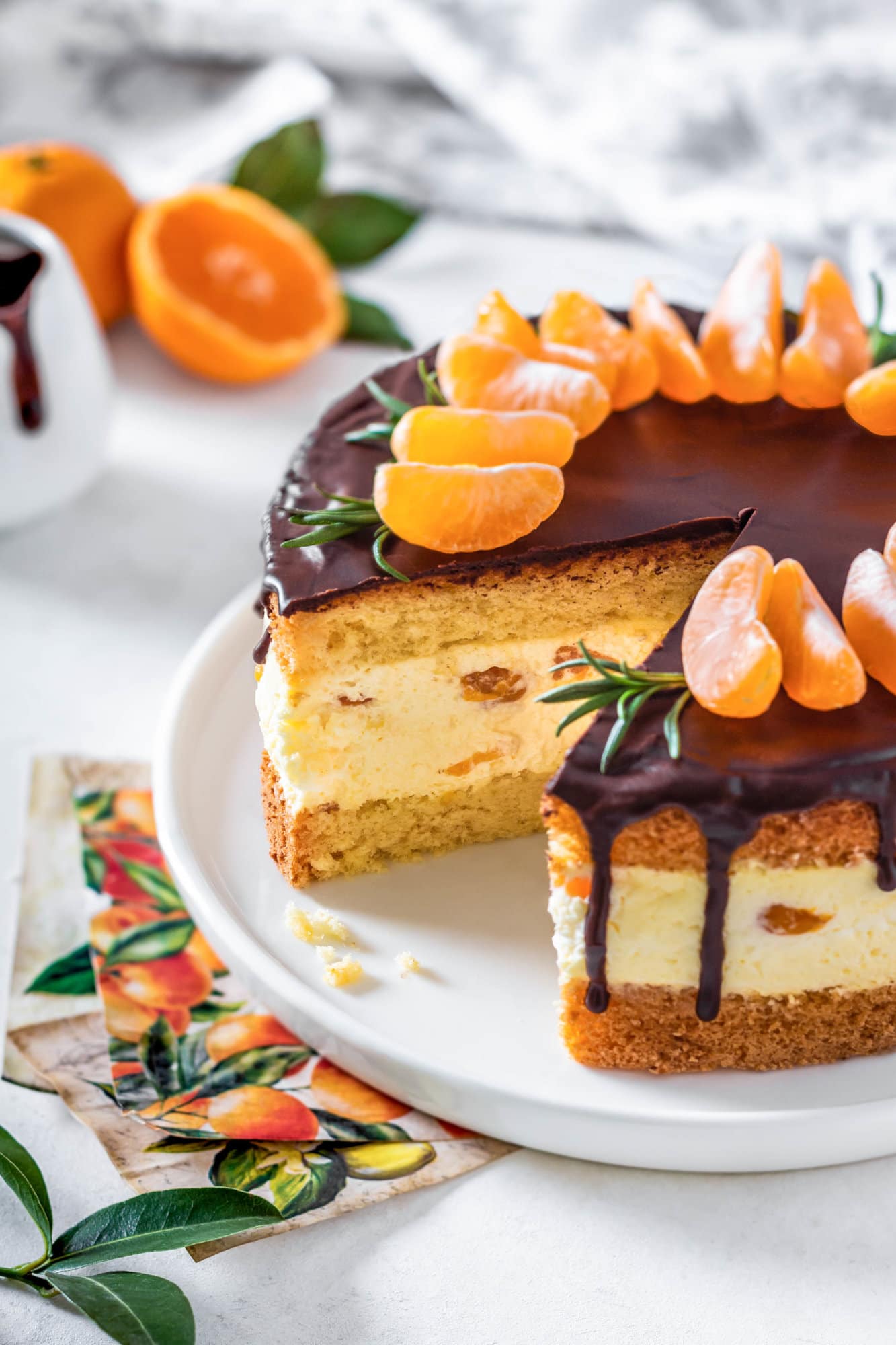 mandarin-mousse-cake-on-white-plate