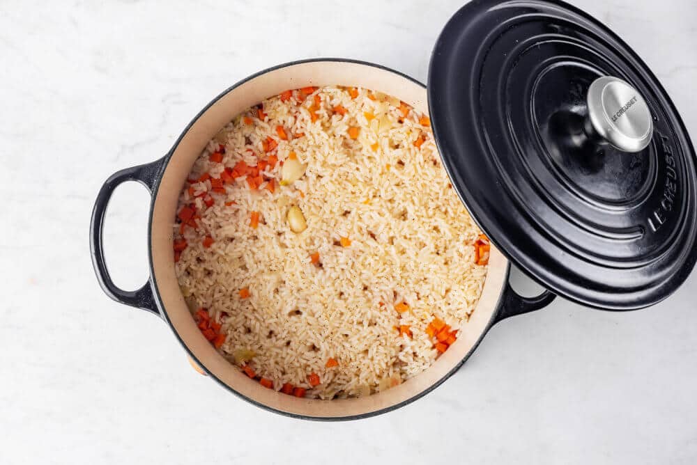 rice-pilaf-in-a-black-pot-with-a-lid