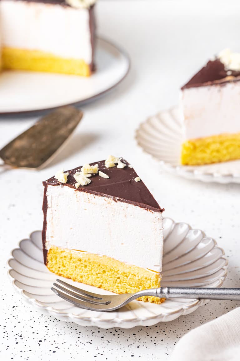 birds-milk-cake-on-a-plate-with-fork-sliced