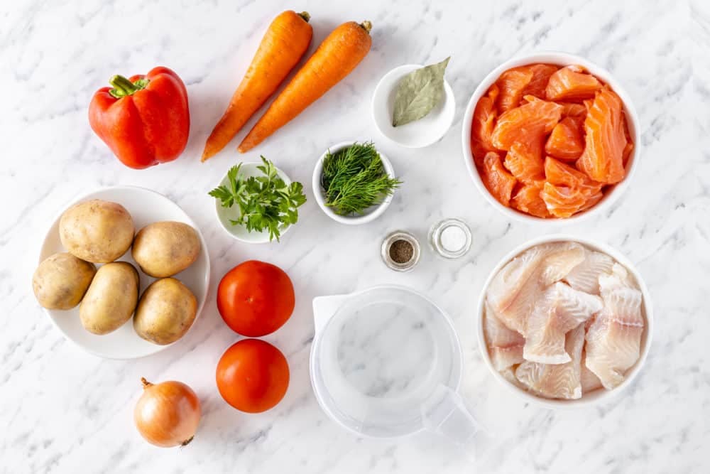 fish-soup-ingredients-potatoes-carrots-bell-pepper-bay-leaf-salt-pepper-tomatoes-fish-dill-parsley-water-onion-and-salt