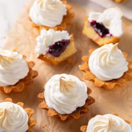 Meringue tartlets with jam filling.