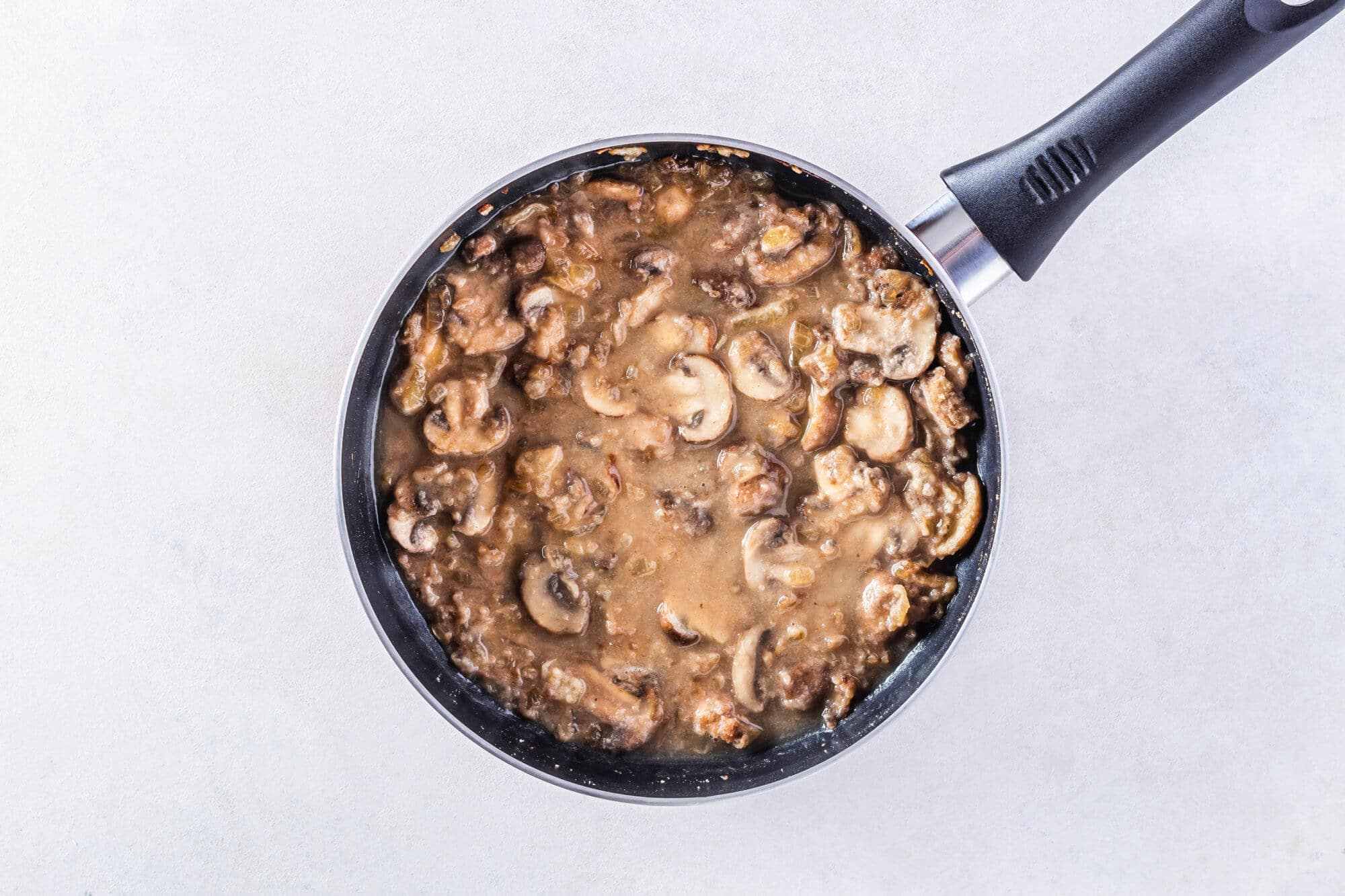 sauted-mushrooms-in-a-pan-and-sauce