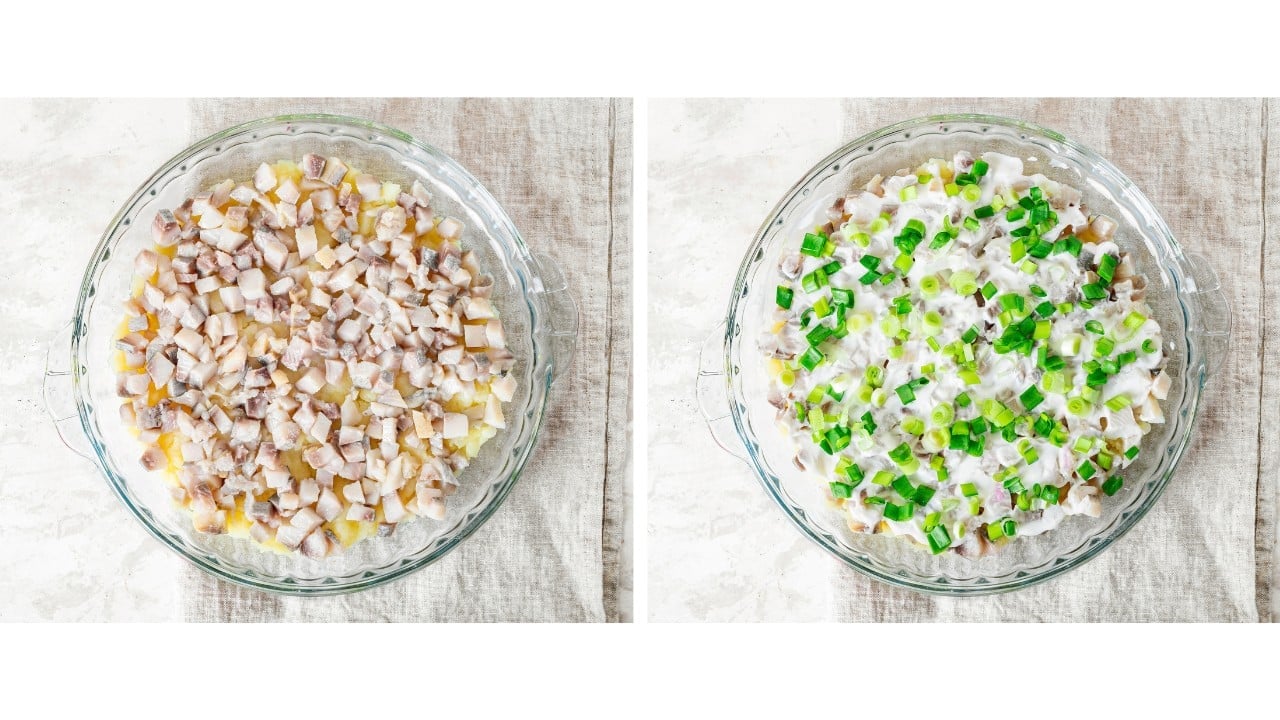 chopped herring in a plate and chopped green onion on top. 