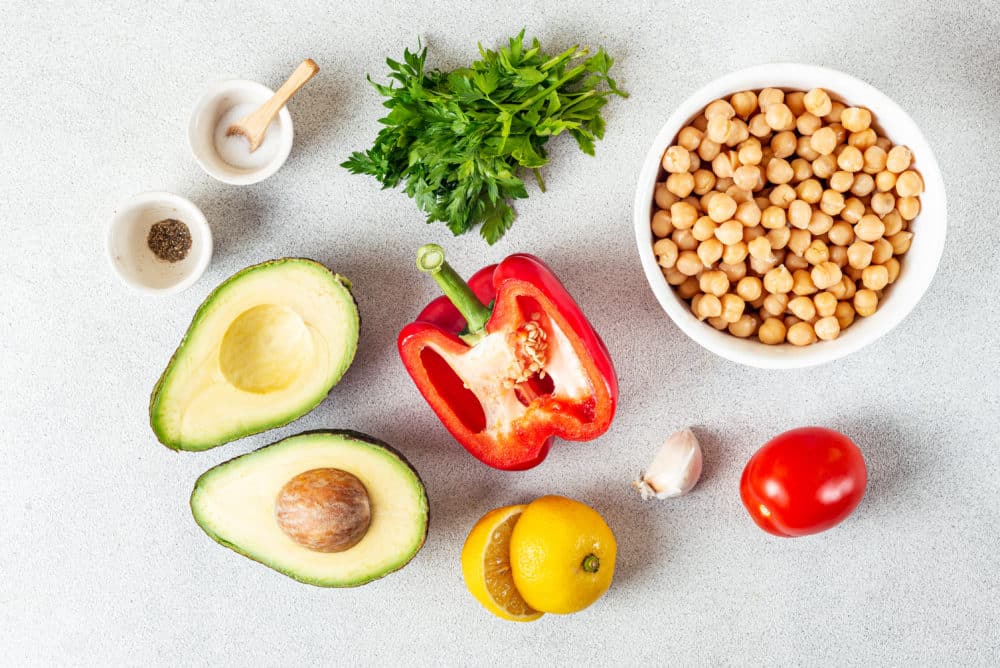 avocado-chickpea-salad-ingredients-red-pepper-avocado-chickpeas-parsley-salt-pepper-lemon-garlic-tomato
