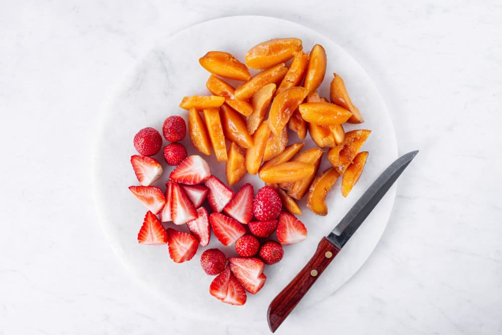 fresh-fruit-on-a-cutting-board-with-a-knife