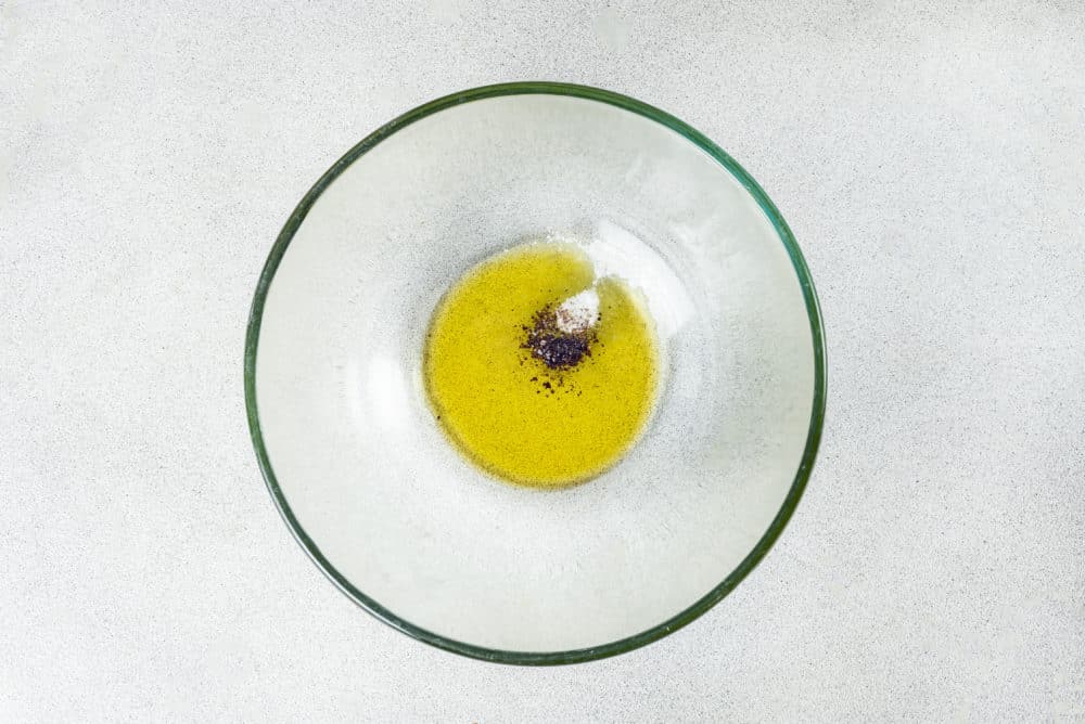 olive-oil-and-salt-and-pepper-in-a-clear-bowl