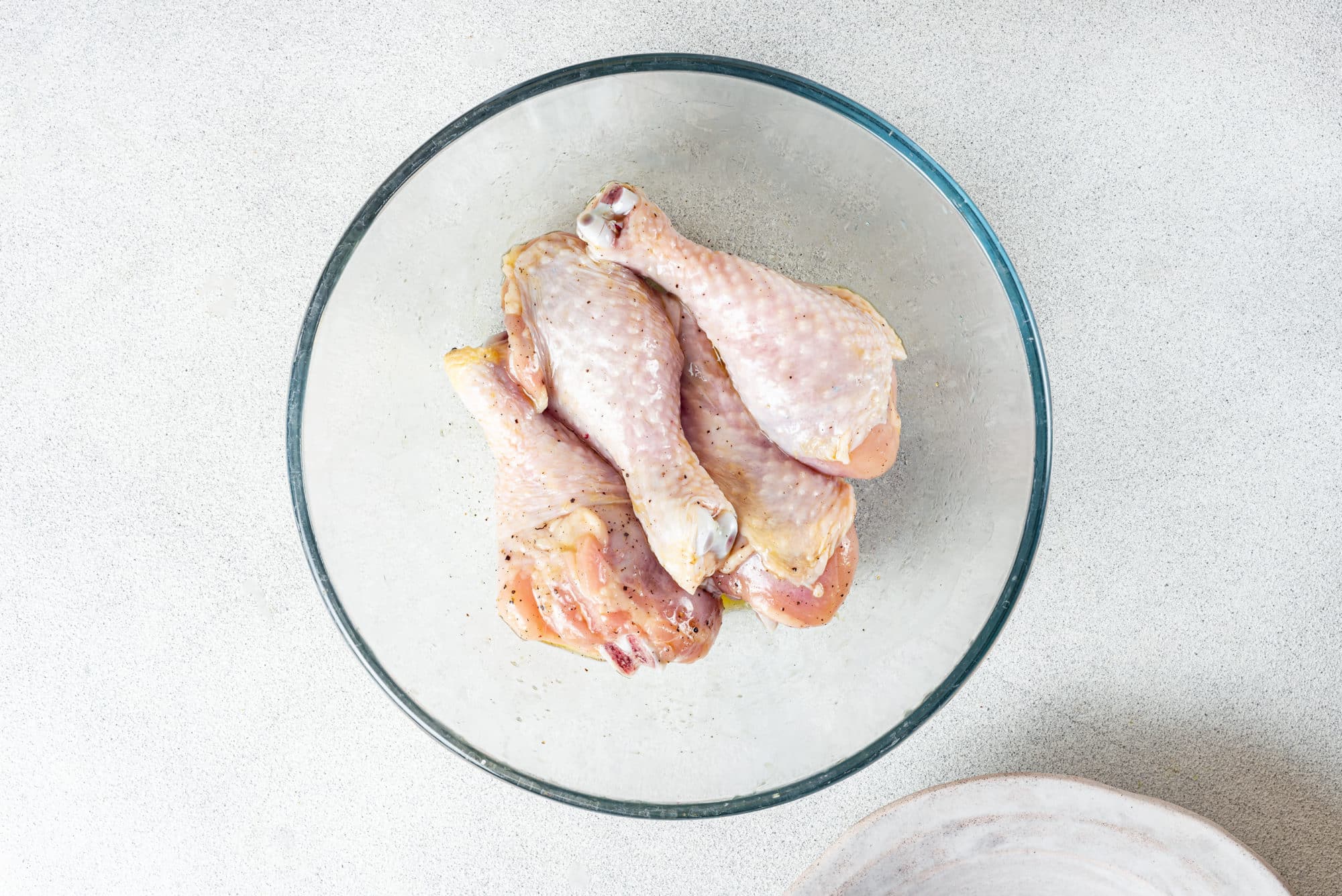 chicken-drumsticks-in-a-clear-bowl