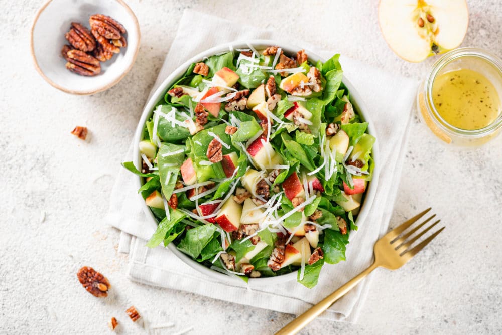 apple salad in a bowl on a folded towel.