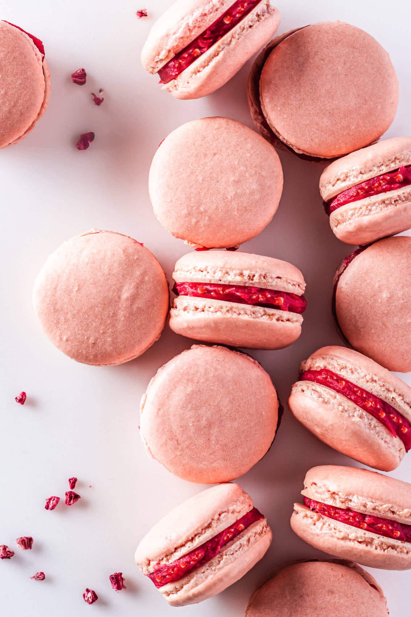 Raspberry macarons with jam filling.