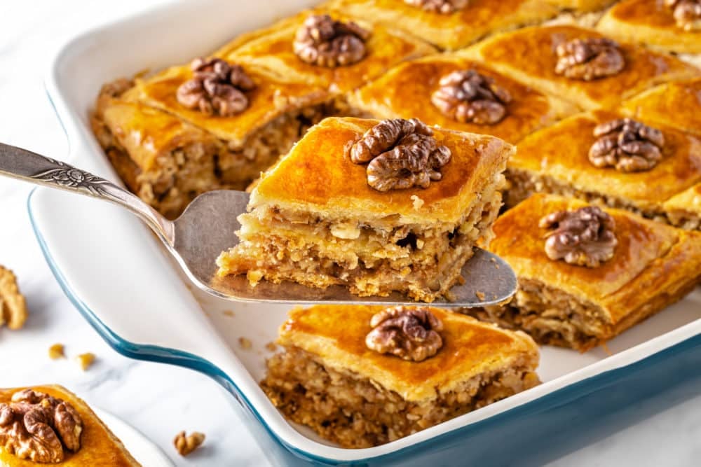 baklava-in-a-baking-tray-with-one-slice-on-a-spatula