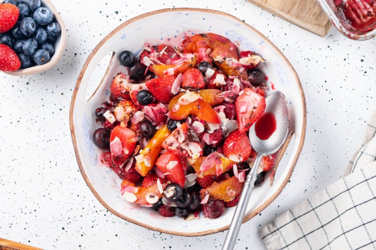 warm-fruit-salad-in-a-bowl-with-a-spoon
