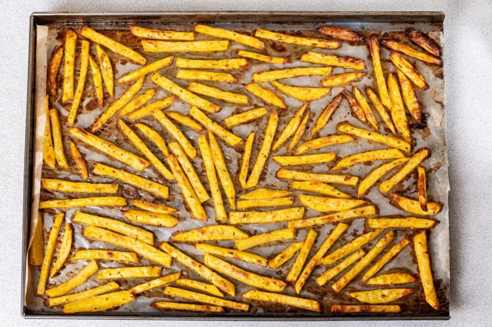 Roasted potatoes on a baking sheet.