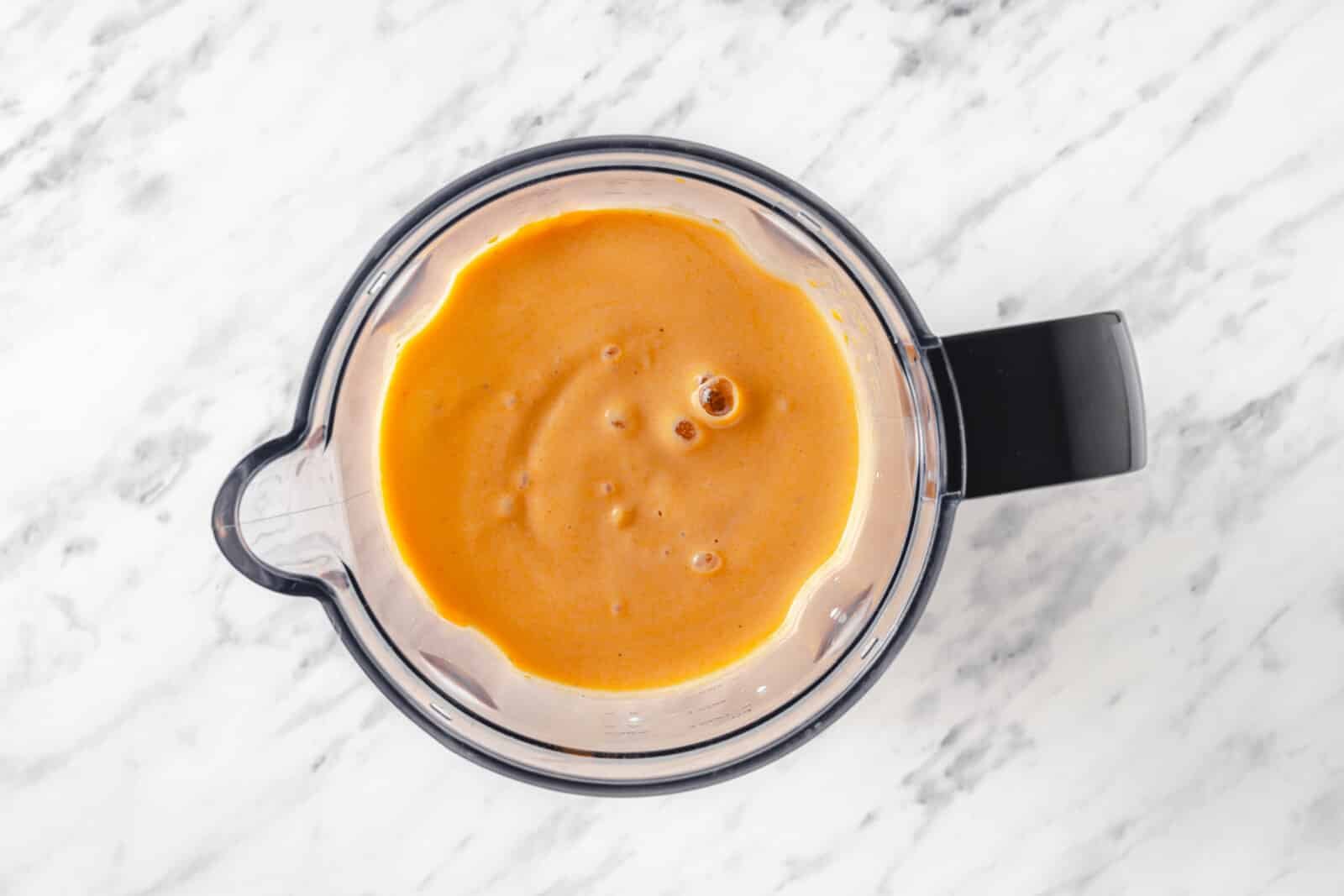 blended pumpkin pie smoothie in blender.