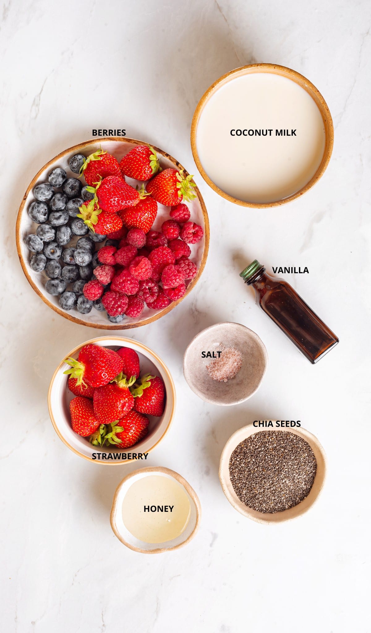 Strawberry chia seed pudding- coconut milk, berries, vanilla, salt, strawberries, chia seeds, and honey.