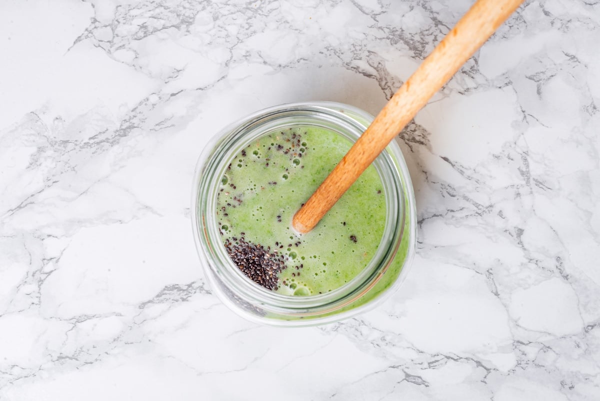 spinach with chia seeds added in a mason jar. 