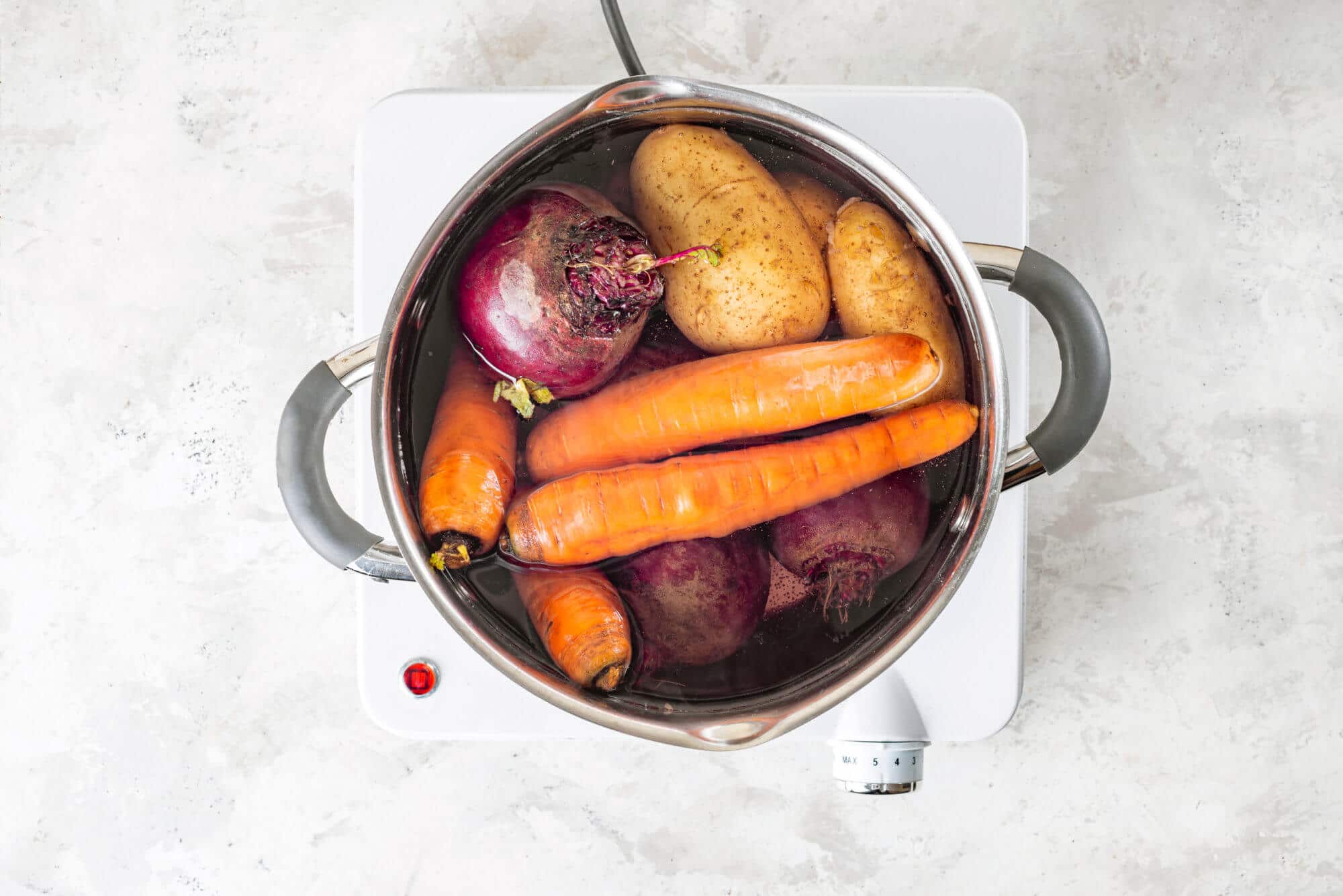 beets-carrots-and-potatoes-boiling-in-a-pot-with-water