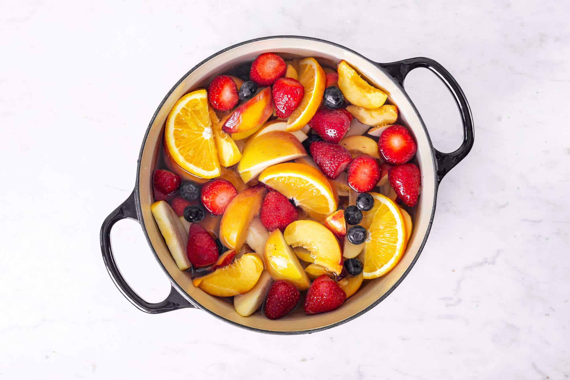 fruits-and-water-in-a-large-pot