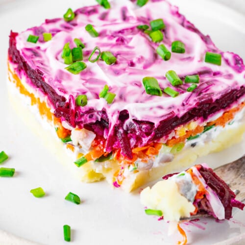 herring-salad-piece-on-a-white-plate