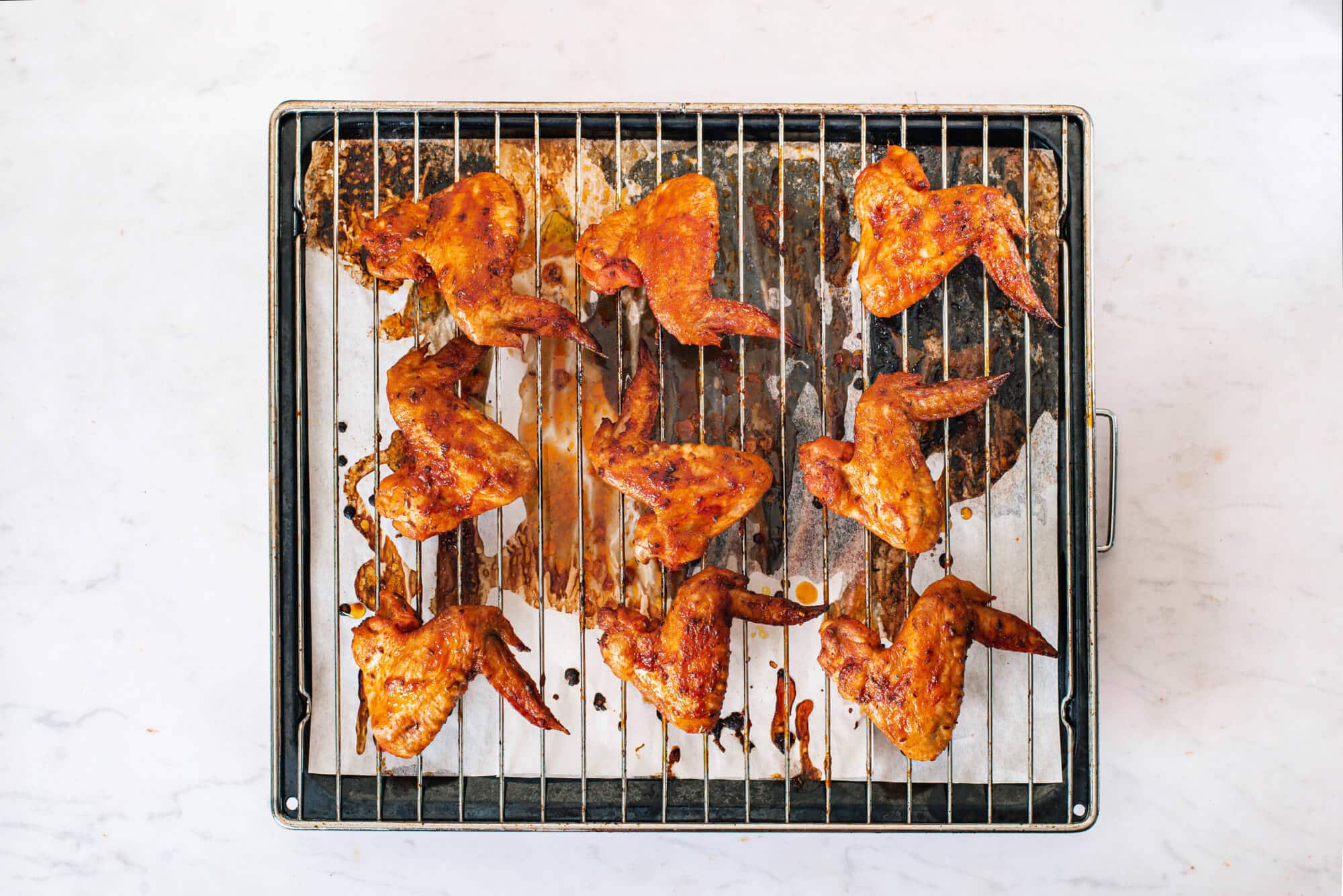 baked-chicken-wings-on-a-wire-rack-on-a-baking-tray