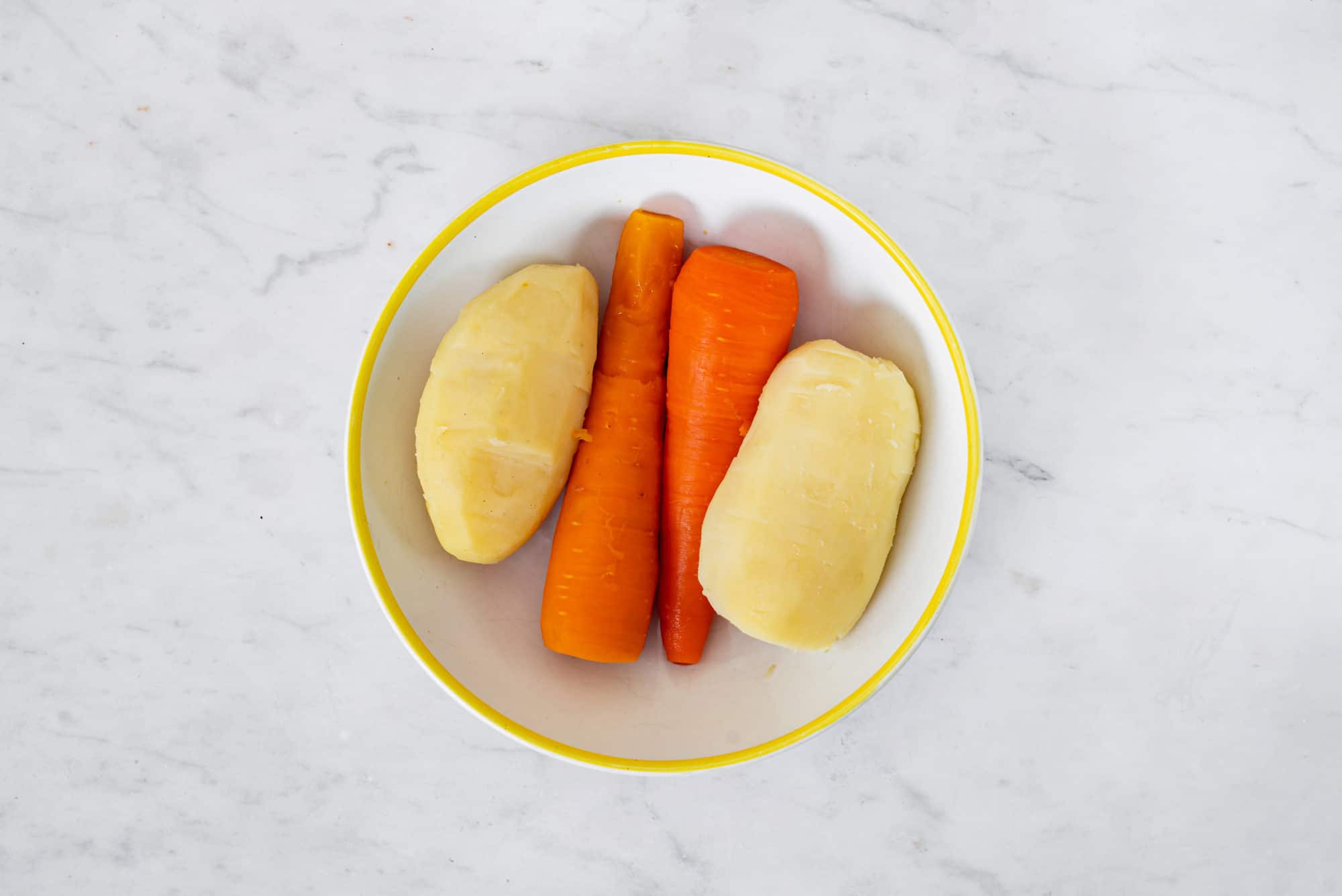 cooked-potato-and-carrot-in-a-small-bowl