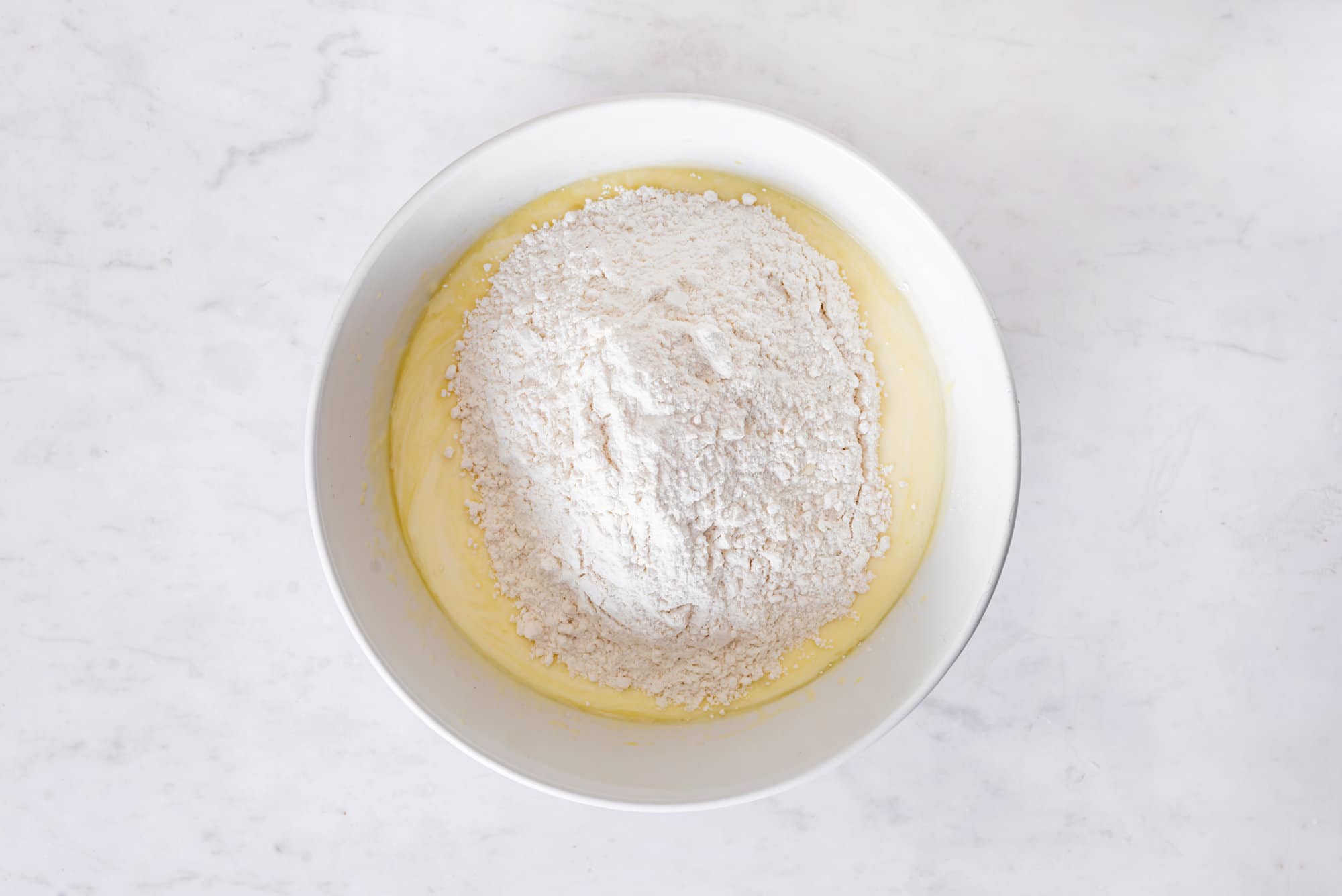 dough-for-rogaliki-process-in-a-white-bowl