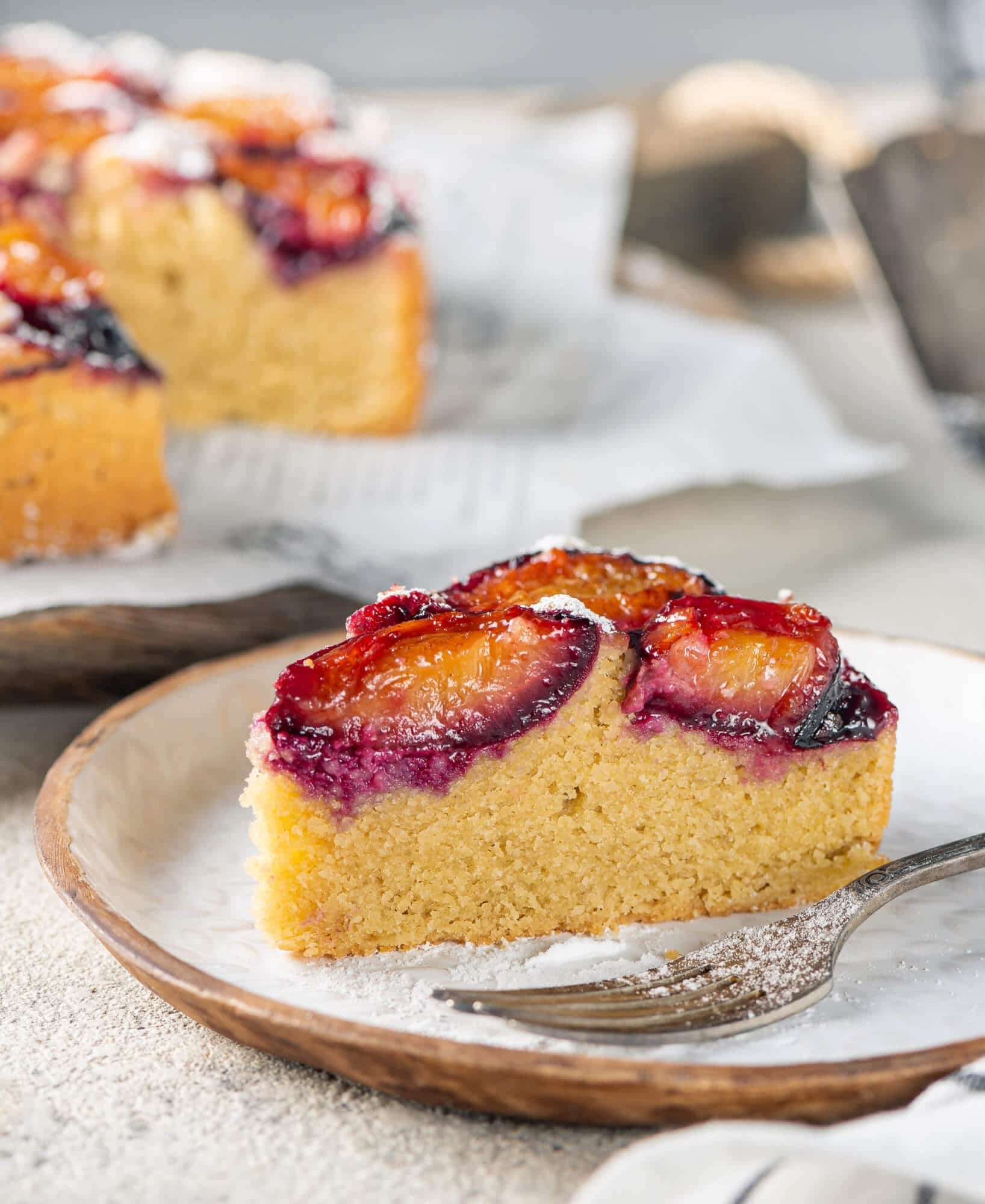 plum-cake-slice-on-a-plate-with-a-fork