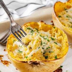 spaghetti-squash-on-a-baking-tray-with-a-fork