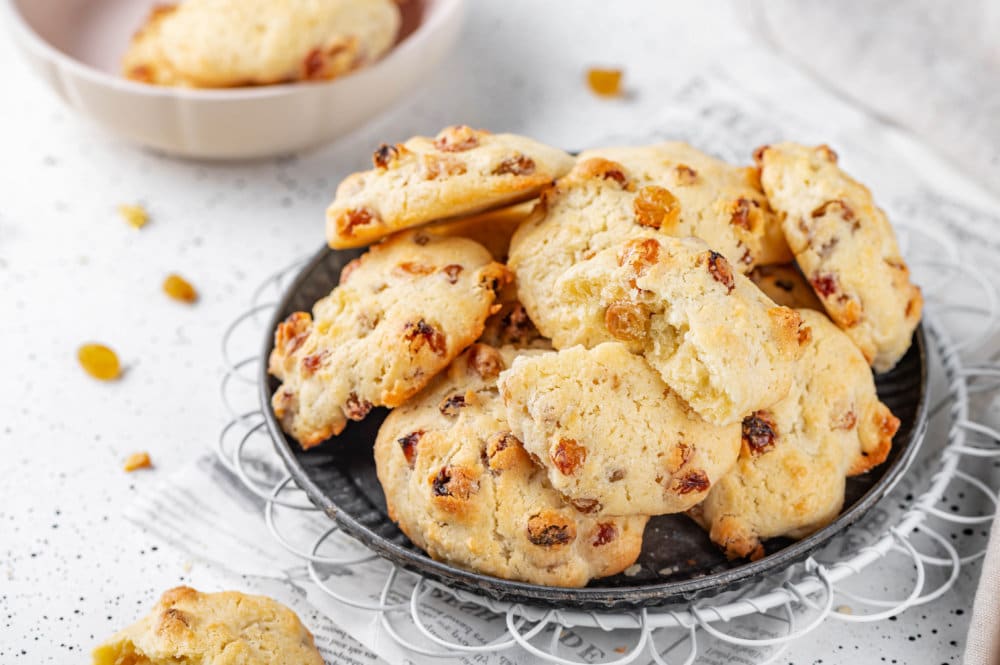 golden-raisin-cookies-on-a-plate-on-a-wire-rack