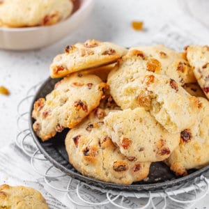 A plate of fresh baked golden raisin cookies.