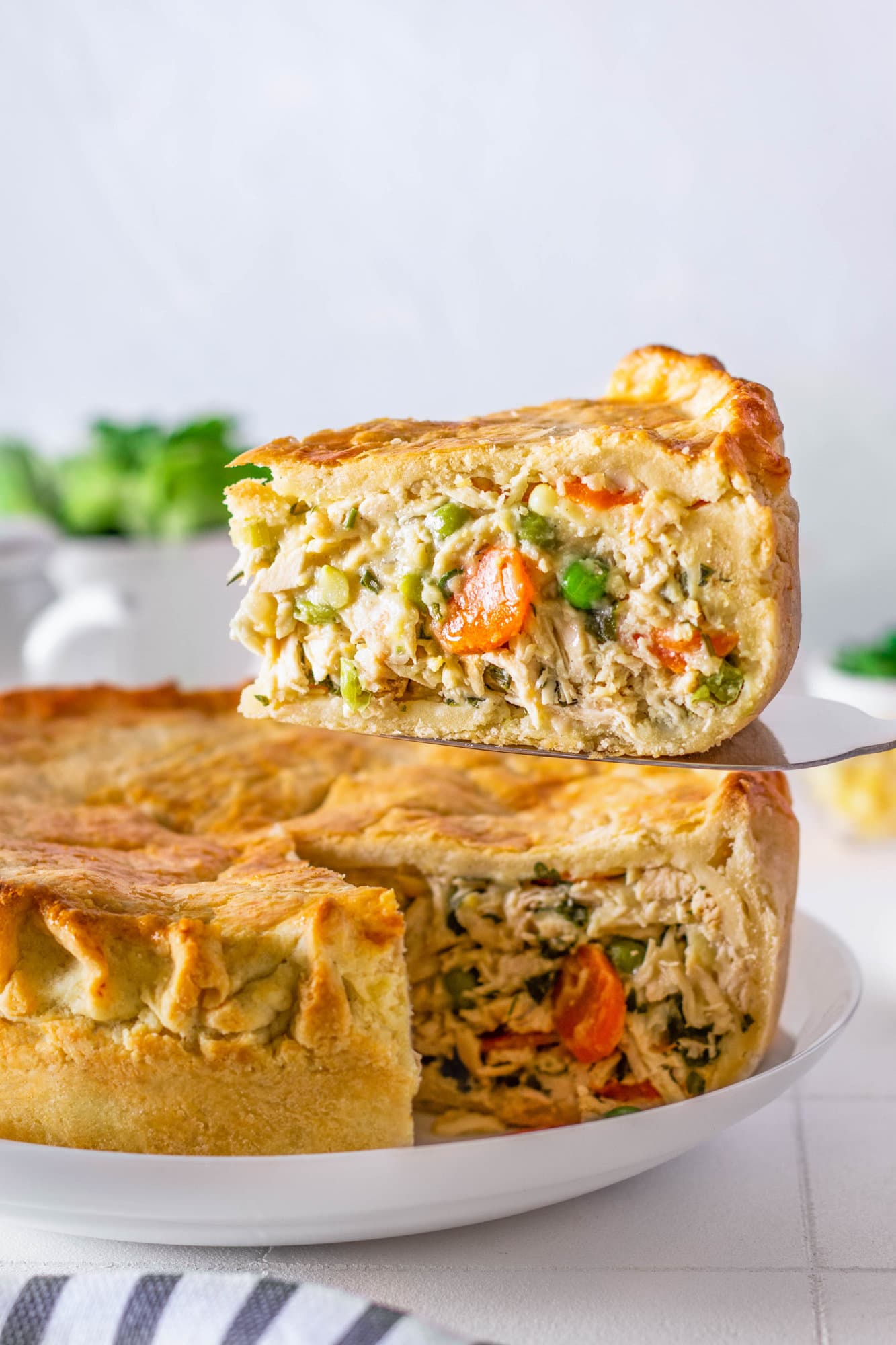 chicken-pot-pie-on-plate-and-slice-on-a-fork