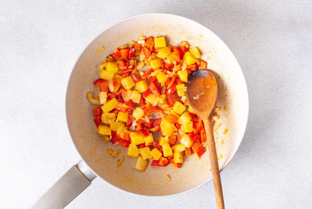 in-skillet-chopped-red-bell-peppers-onions-pineapple-chunks