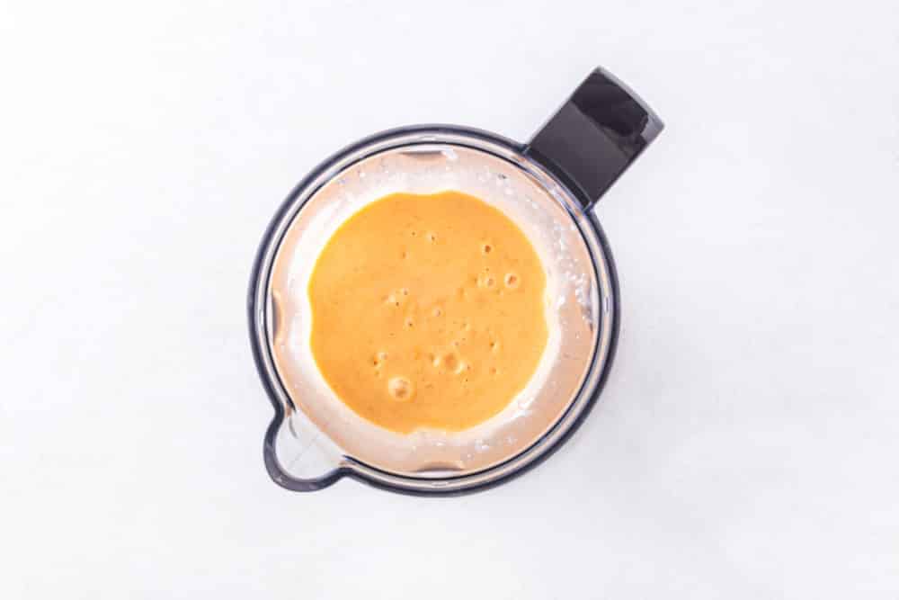 blended orange smoothie with apricots.