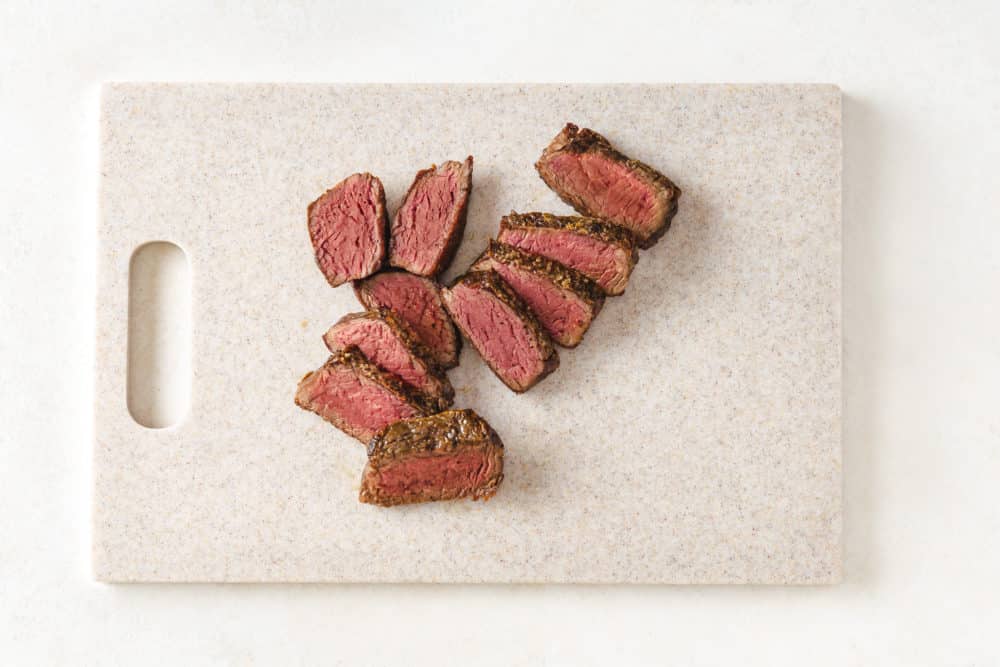 filet-mignon-sliced-on-a-cutting-board