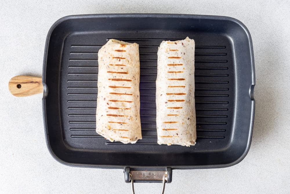 Wraps on a grilling skillet.