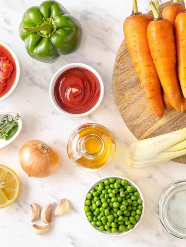 30 minute vegetable soup ingredients- vegetable broth, parsley, celery, cabbage, carrot, tomato sauce, bell pepper, diced tomato, spices, salt, garlic, lemon, onion, olive oil, water, and green beans.