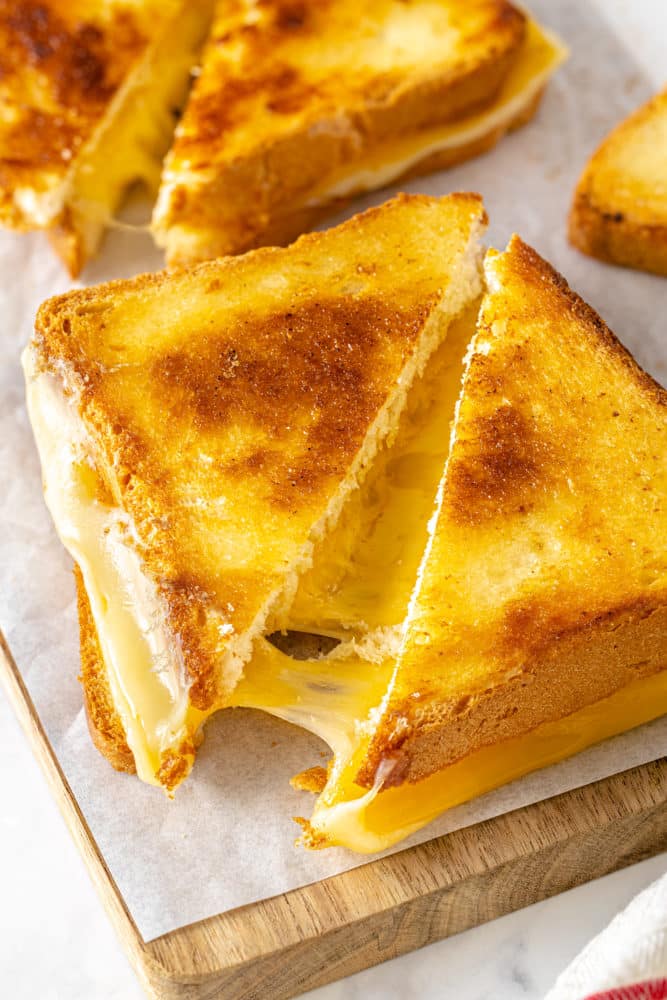 prepared grilled cheese sandwich sliced diagonally.