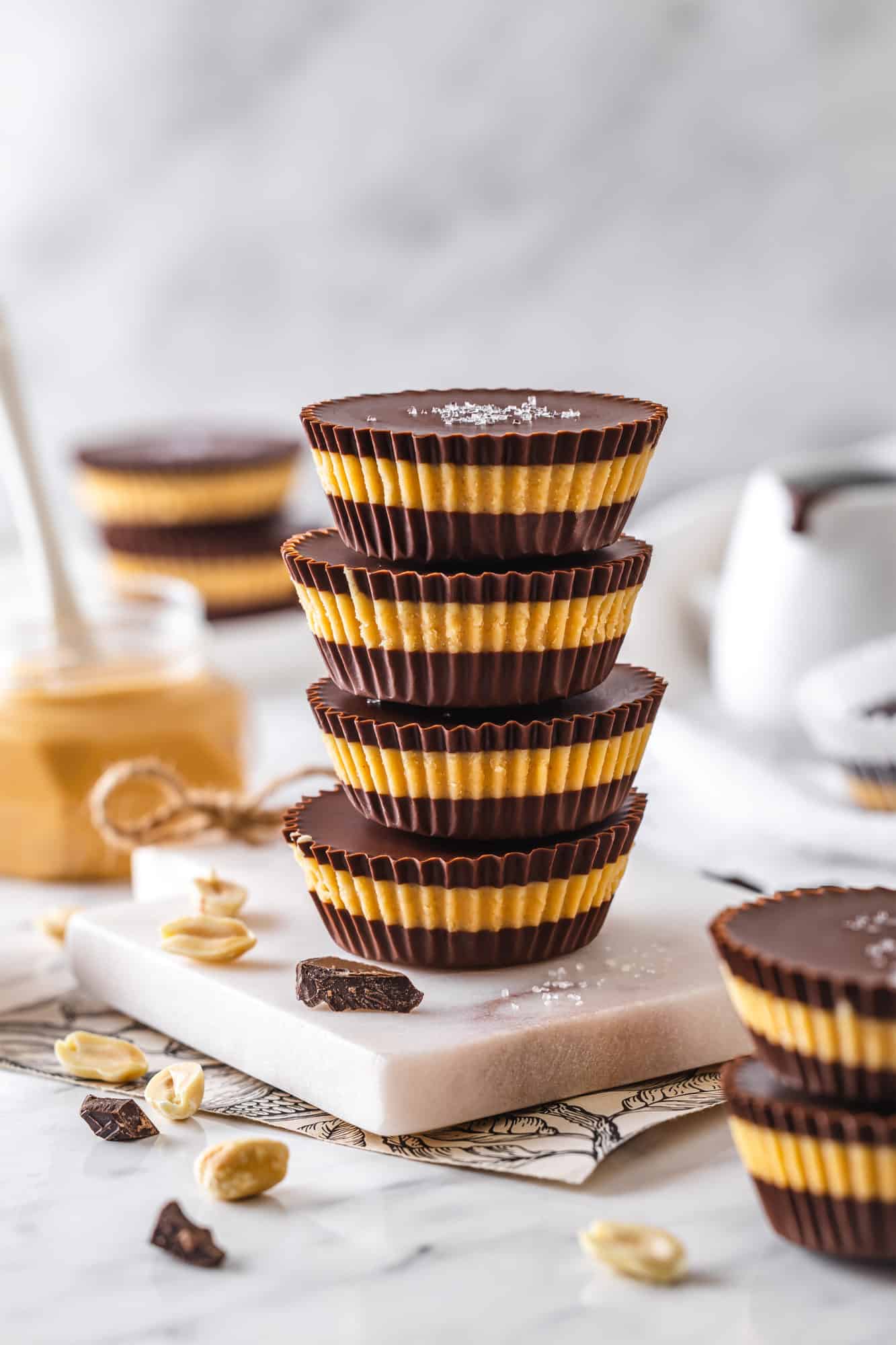 A tall stack of peanut butter cups with salt on top.