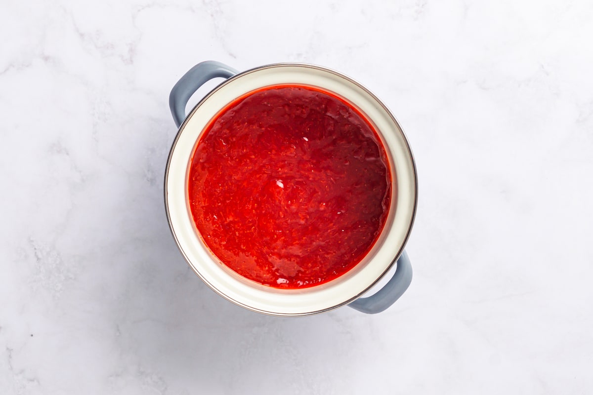strawberry jam in a sauce pan.