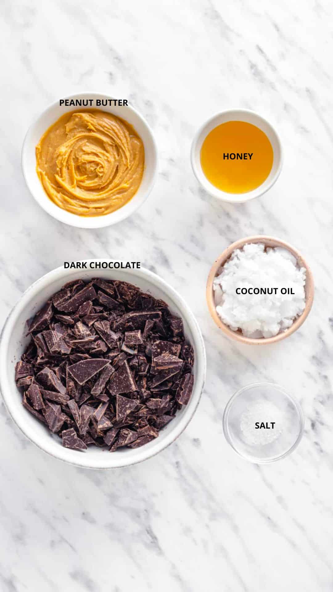 Dark chocolate peanut butter cups ingredients honey, peanut butter, coconut oil, dark chocolate, and salt.