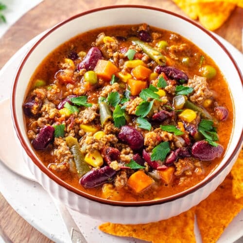 ready cooked chili in a bowl with fresh chopped cilantro.