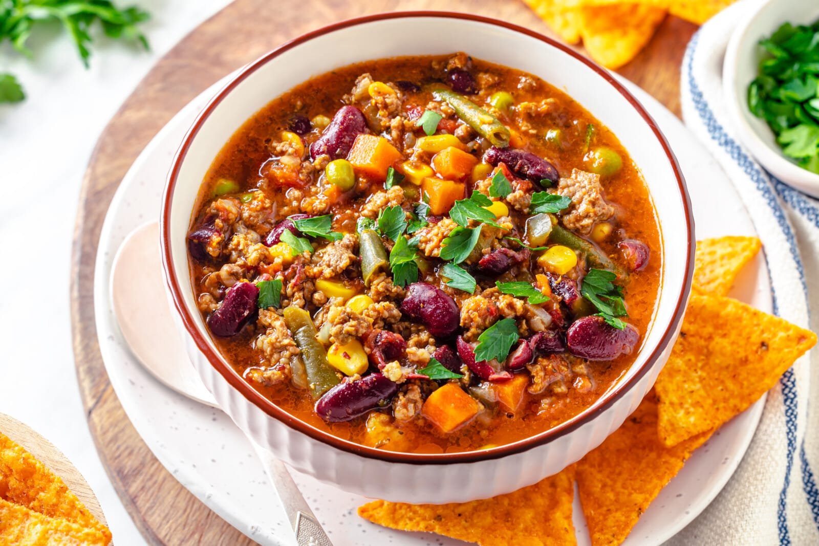 ready cooked chili in a bowl with fresh chopped cilantro.