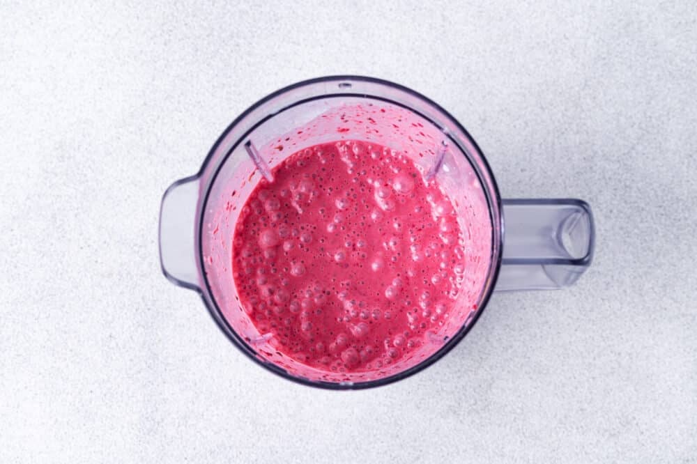 Blended ingredients in a pitcher of a blender.