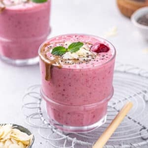 Sweet Cherry Almond Summer Smoothie Cherry smoothie with toppings.