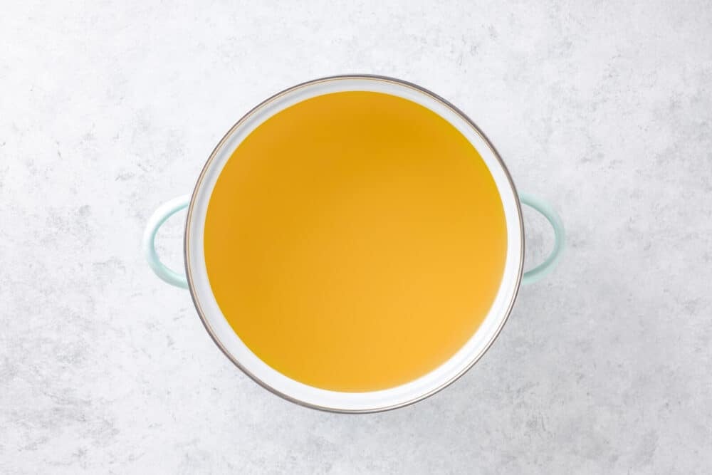 Dashi stock in a large pot.