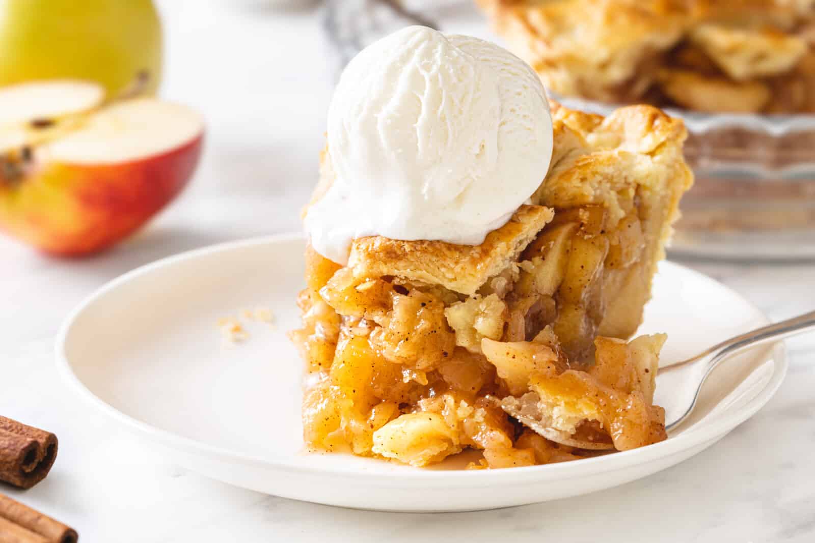 Enjoying a slice of apple pie with icecream.